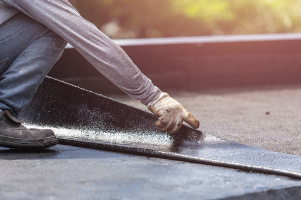 Professional Waterproofing technician working in Glyndon, MD